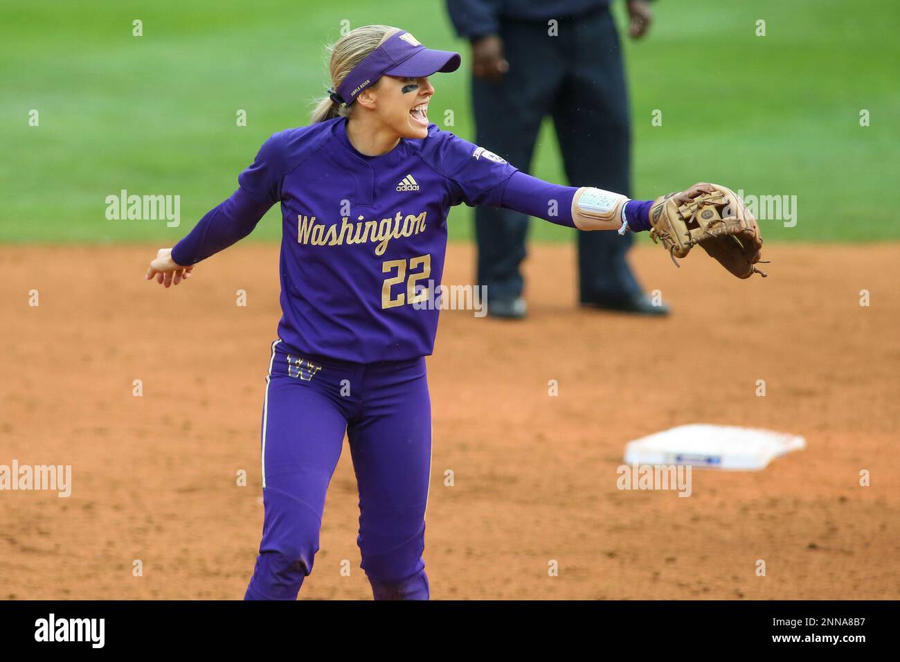 SEATTLE, WA - MAY 23: Washington Huskies infielder Sis Bates (22)  celebrates a out during game 6 of the Seattle regional NCAA tournament  softball game between the Michigan Wolverines and the Washington