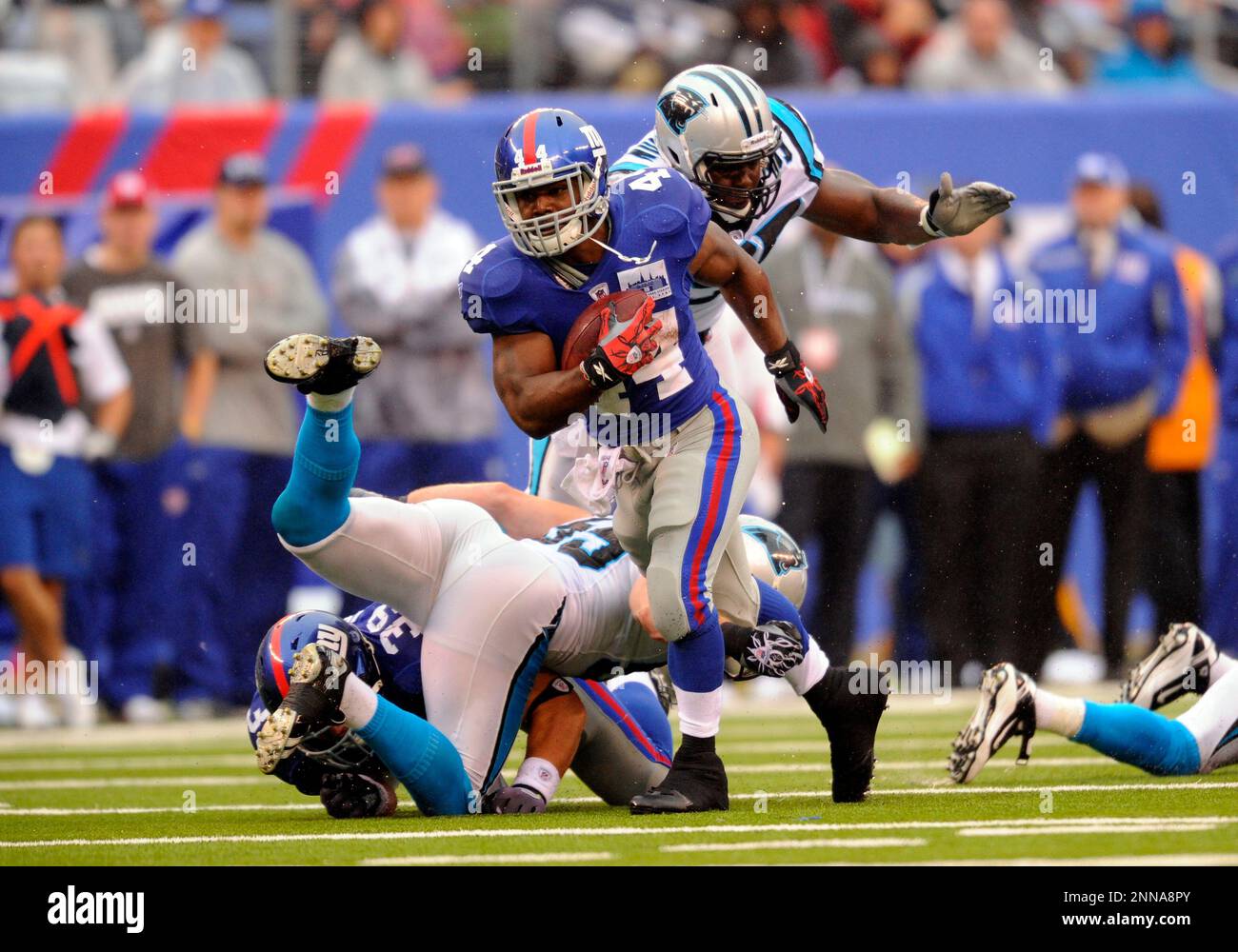 12 September 2010: New York Giants running back Ahmad Bradshaw (44) eludes  tackle from Carolina Panthers defenders during the second half of the  Carolina Panthers vs New York Giants game at the