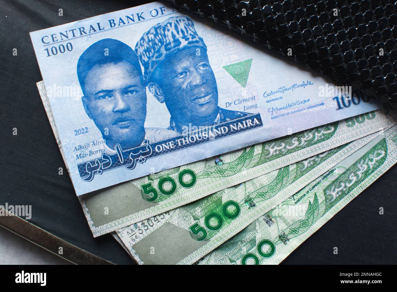 The new Nigerian 1000 Naira note in a black purse, Nigeria's new