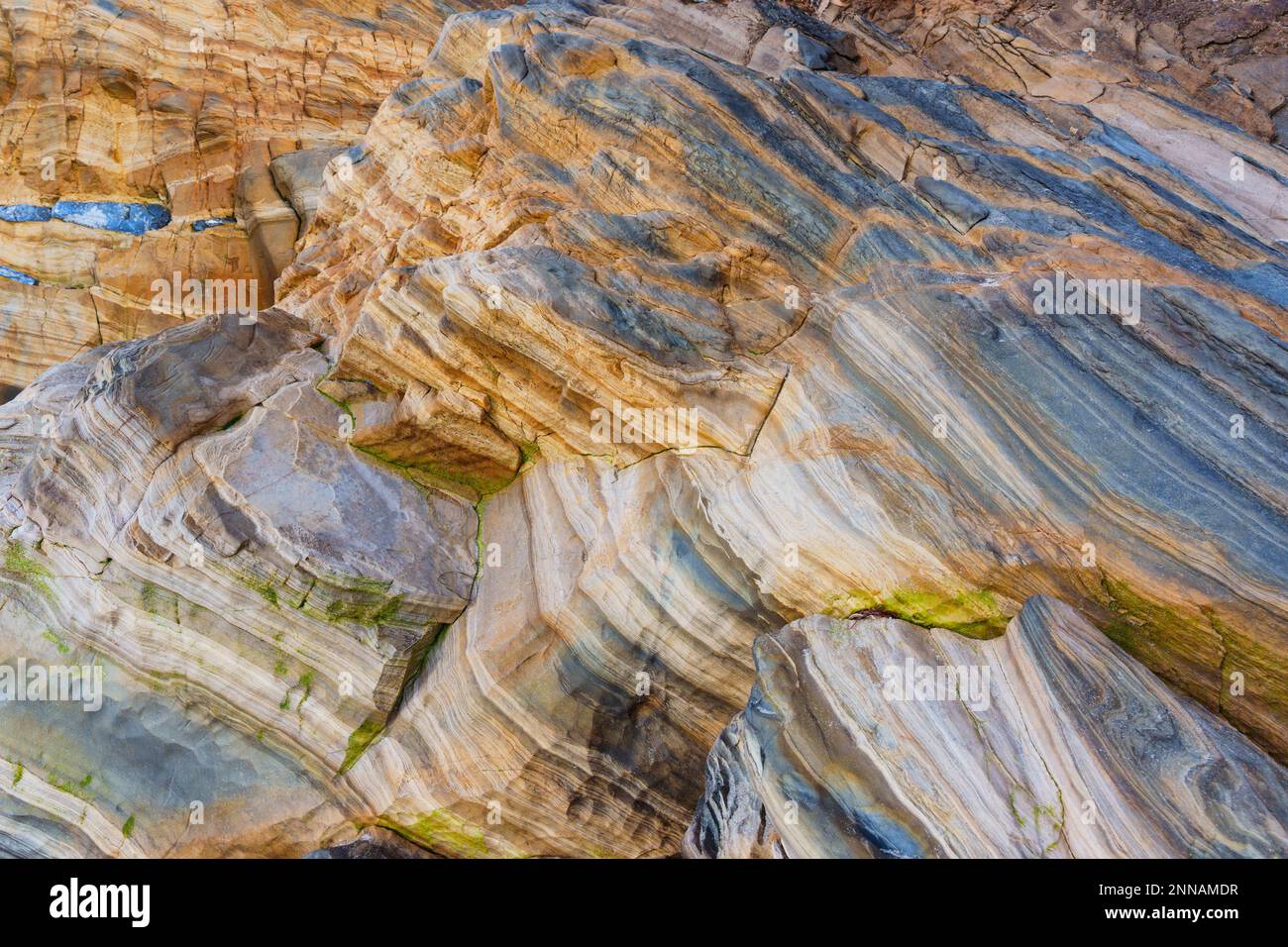 Natural background made of layered rocks, creating an intriguing and unique design. Stock Photo