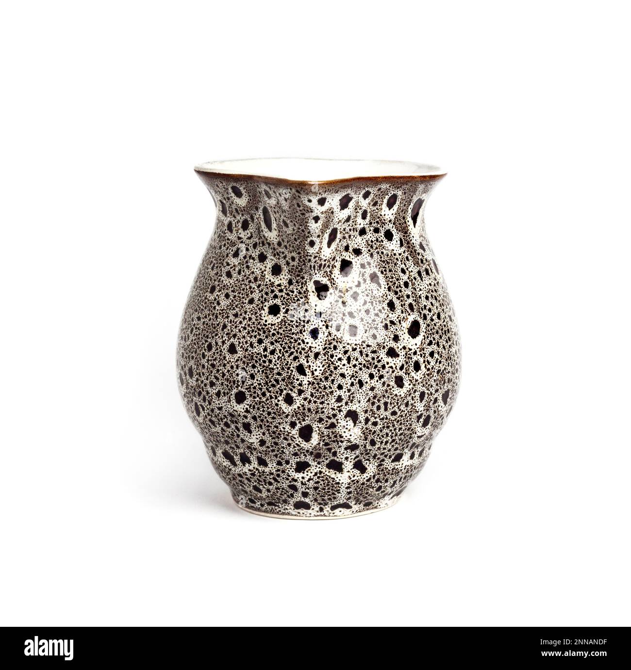 Glazed ceramic milk jar isolated on a white background Stock Photo