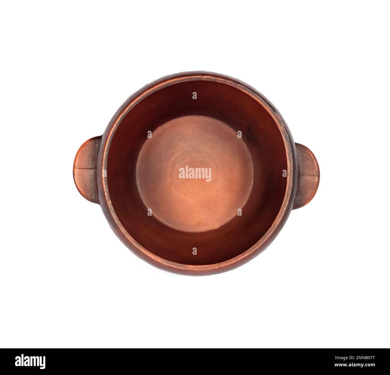 Brown ceramic rustic bowl isolated on white background. Top view Stock Photo