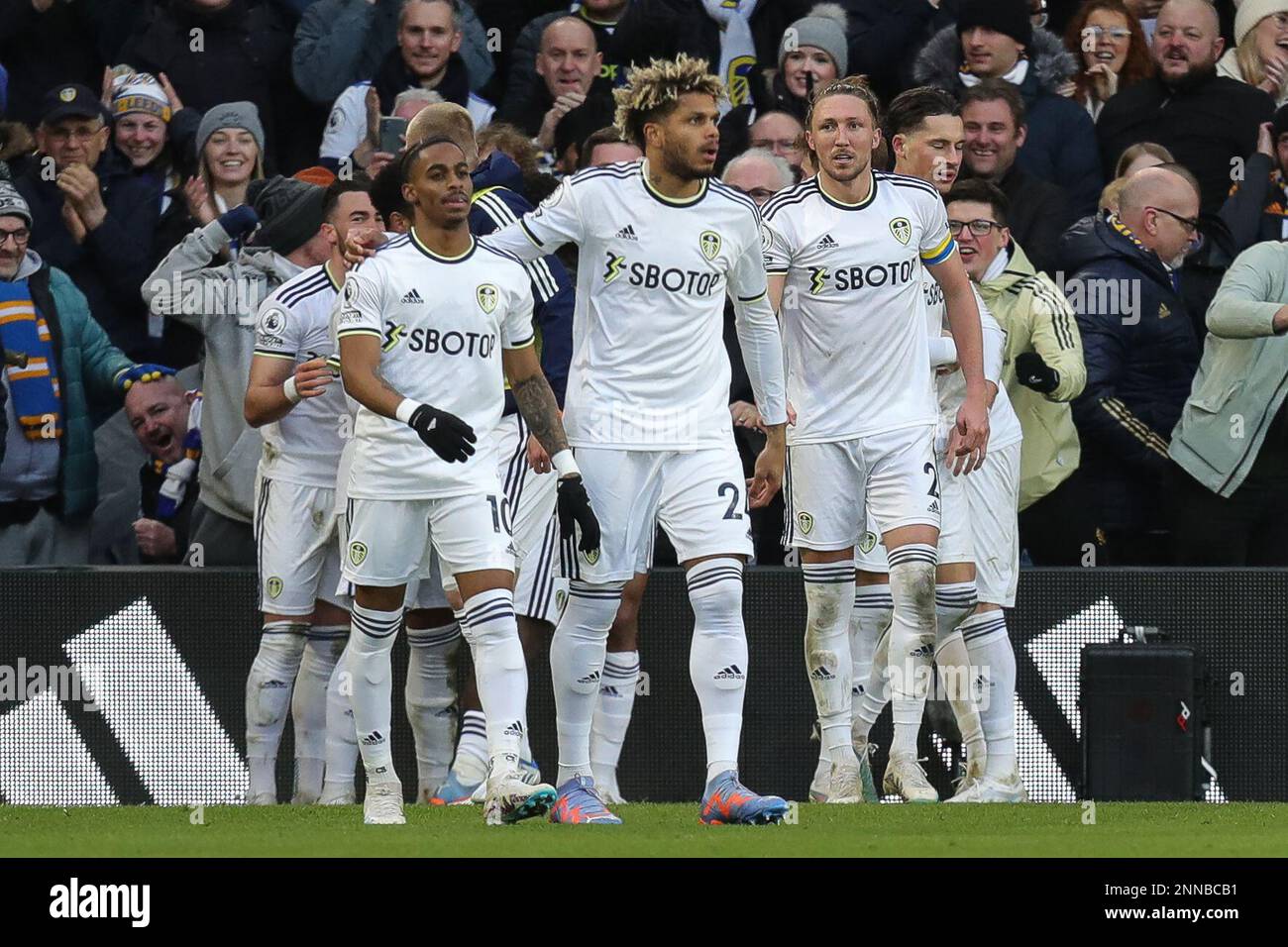 The Leeds players celebrate the opening goal in the second half of ...