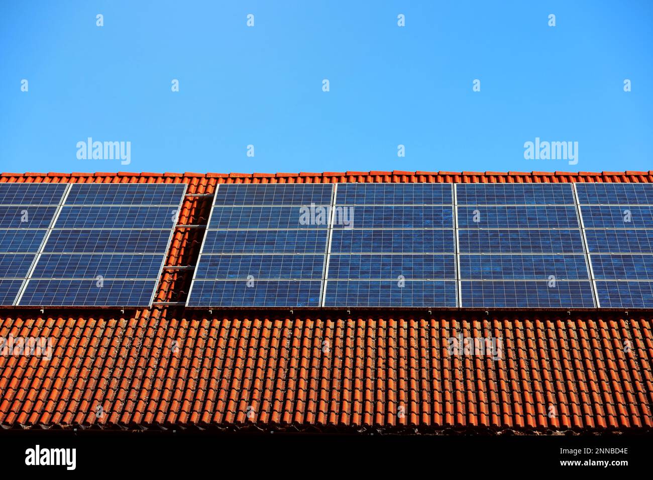 Solar panel installed on a roof Stock Photo - Alamy