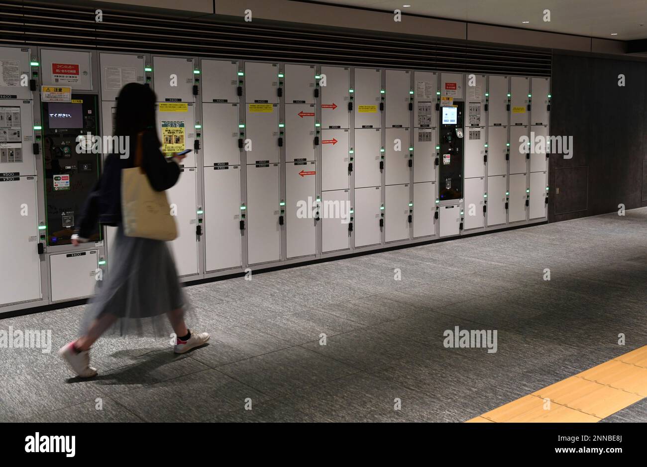Luggage lockers are seen at an underground passage in Tokyo on April 15
