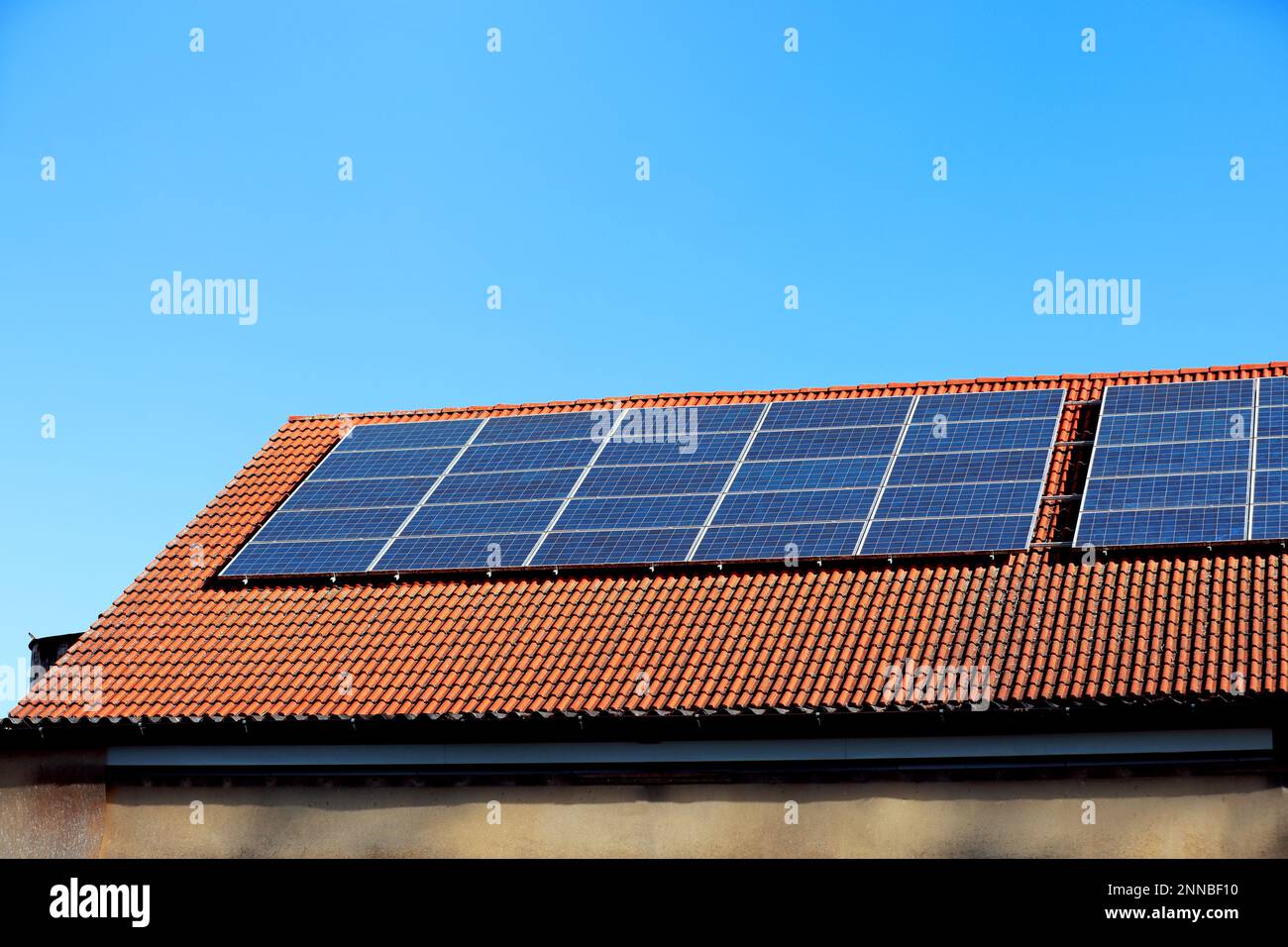 Solar panel installed on a roof Stock Photo - Alamy