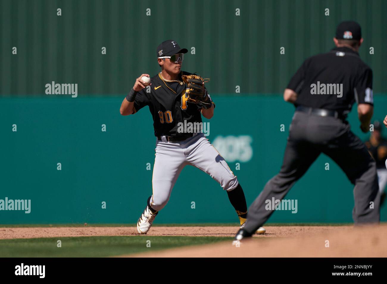 Pittsburgh Pirates shortstop Ji-Hwan Bae (90) throws to first base during a  Major League Spring Training game against the Toronto Blue Jays on March 1,  2021 at TD Ballpark in Dunedin, Florida. (