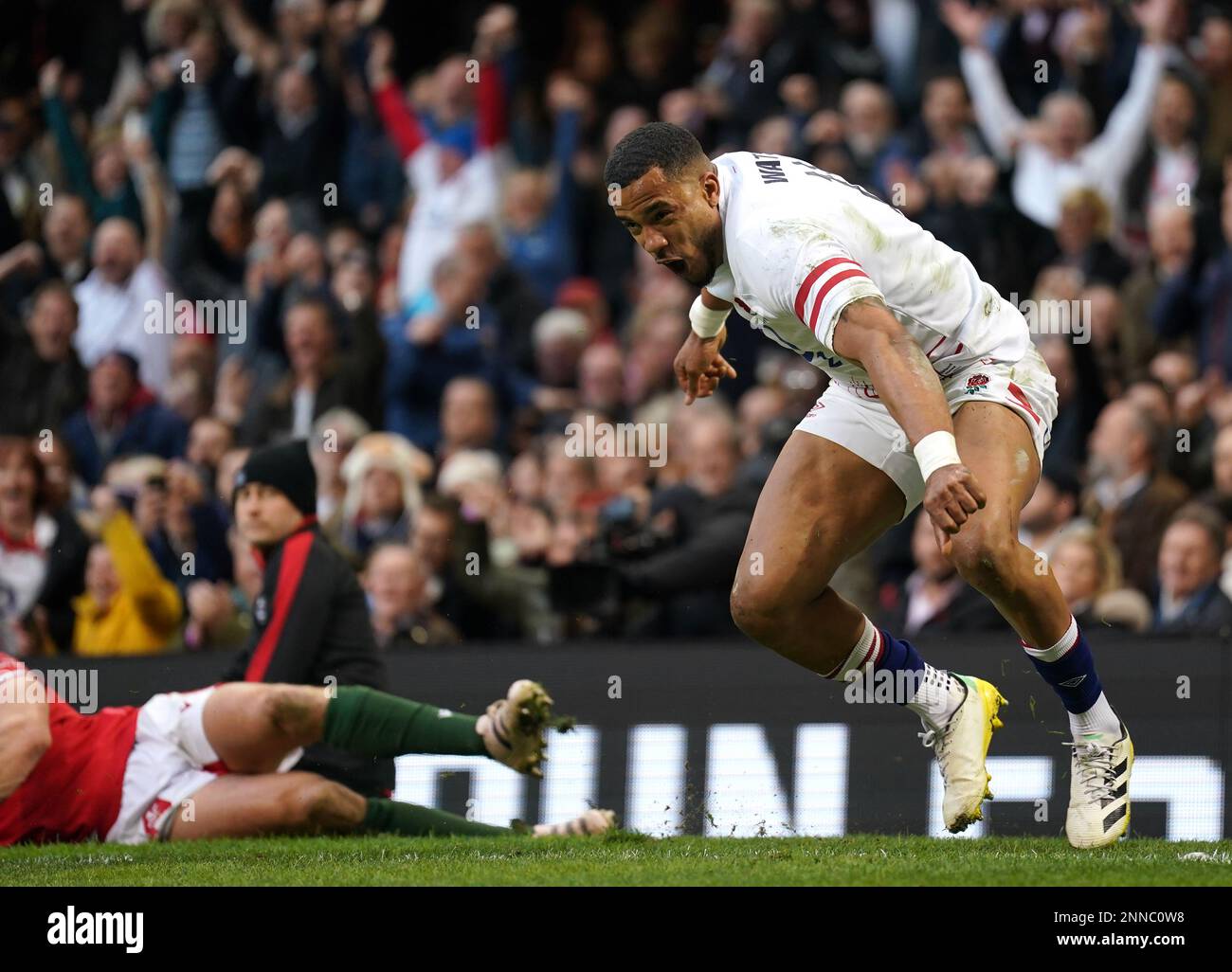 Englands Anthony Watson celebrates scoring their sides first try of the game during the Guinness Six Nations match at the Principality Stadium, Cardiff