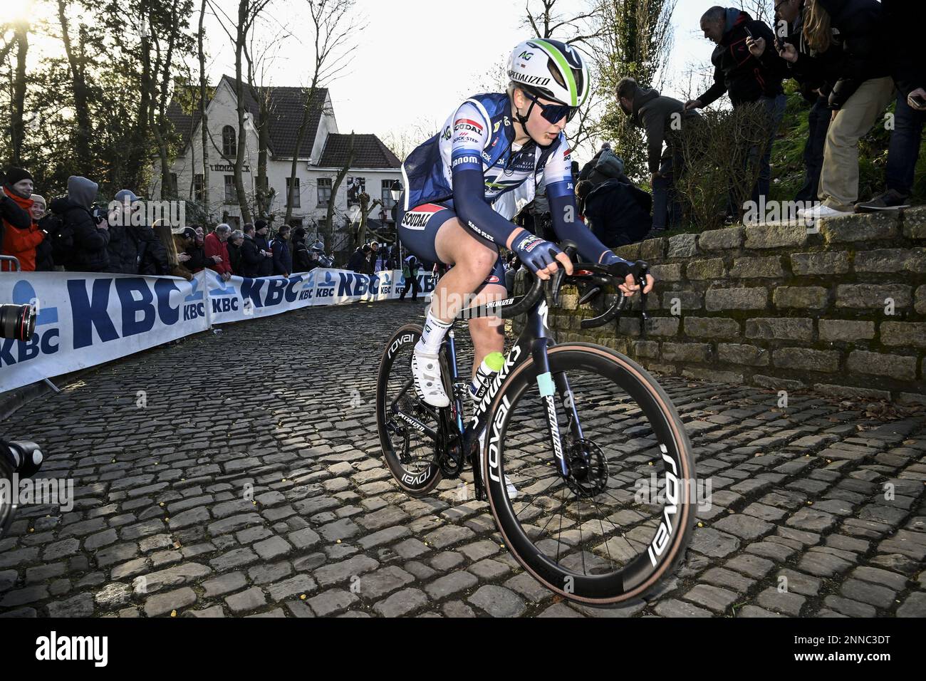Belgian Marthe Goossens of AG Insurance - NXTG team in action on the 'Muur' during the women's one-day cycling race Omloop Het Nieuwsblad, for the first time part of the Women's World Tour races, 132,2 km from Gent to Ninove, Saturday 25 February 2023. BELGA PHOTO TOM GOYVAERTS Stock Photo