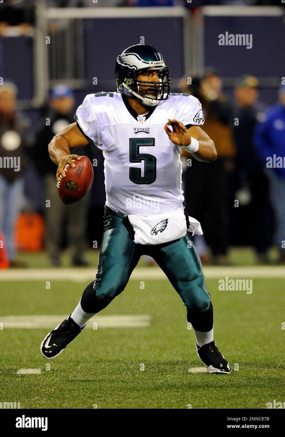 Philadelphia Eagles quarterback Donovan McNabb (5) rolls out in