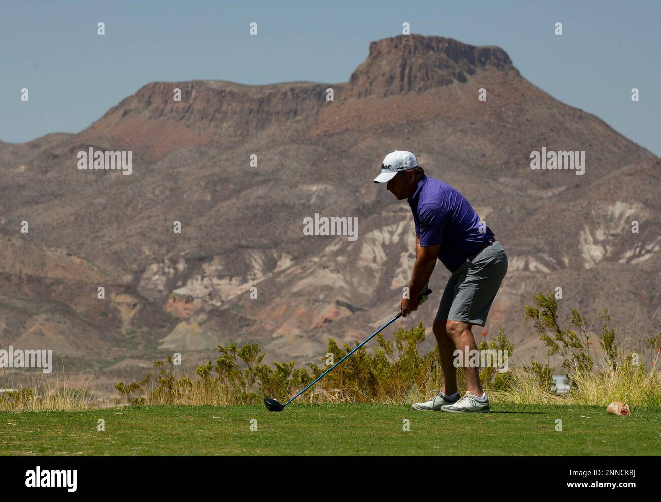 D.J. Ponville prepares to drive off the tee on hole 7 at Black Jack's  Crossing Tuesday, April 13, 2021 at Lajitas Golf Resort in Lajitas, Texas.  Lajitas Mesa as a backdrop makes