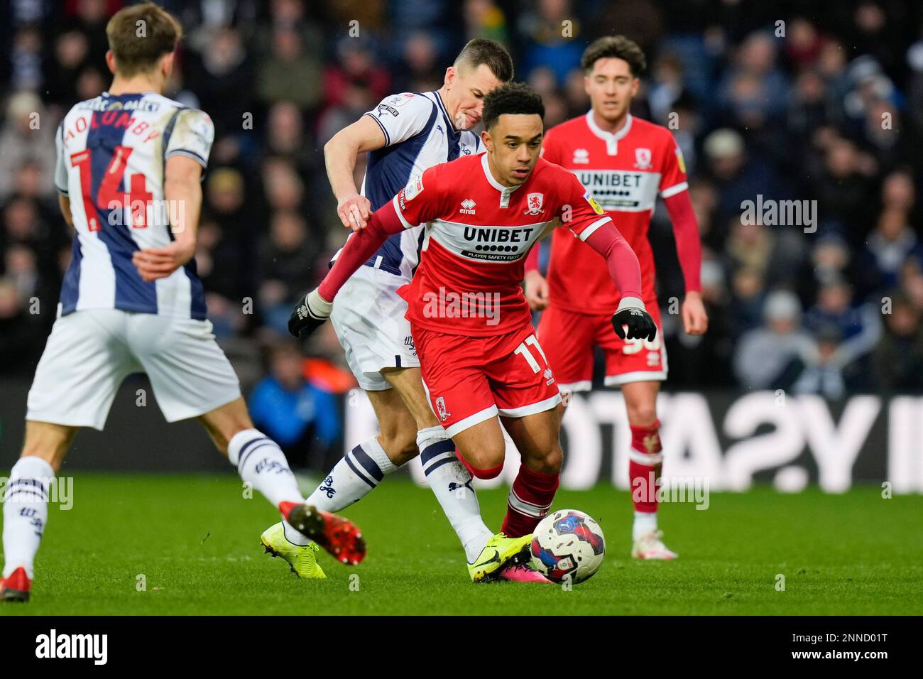Jed Wallace #17 of West Bromwich Albion fouls Aaron Ramsey #11 of Middlesbrough during the Sky Bet Championship match West Bromwich Albion vs Middlesbrough at The Hawthorns, West Bromwich, United Kingdom, 25th February 2023  (Photo by Steve Flynn/News Images) Stock Photo