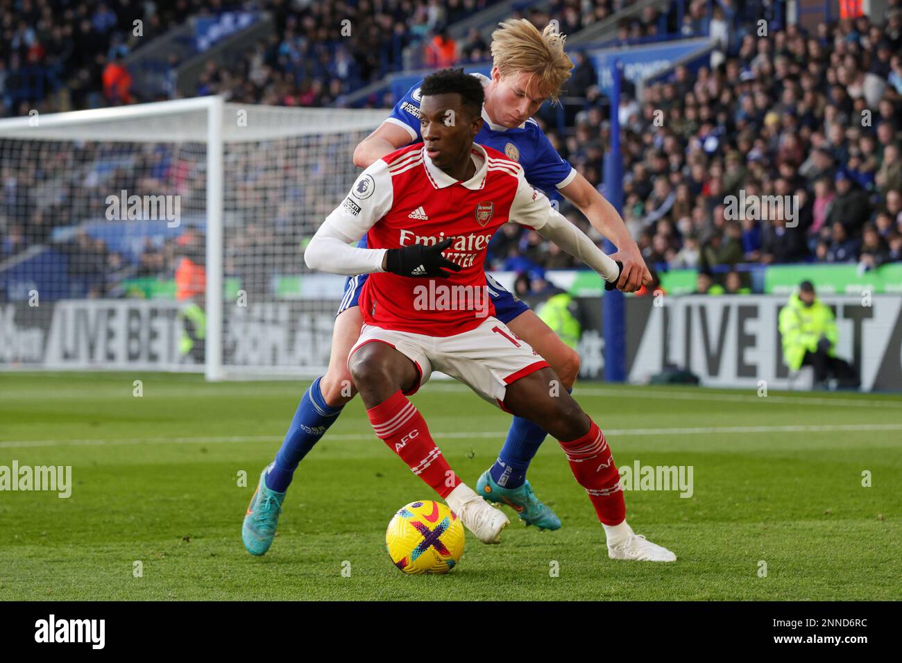 Leicester, UK. 25th Feb 2023. Arsenal's Eddie Nketiah is challenged by Leicester City's Victor Kristiansen during the second half of the Premier League match between Leicester City and Arsenal at the King Power Stadium, Leicester on Saturday 25th February 2023. (Photo: John Cripps | MI News) Credit: MI News & Sport /Alamy Live News Stock Photo