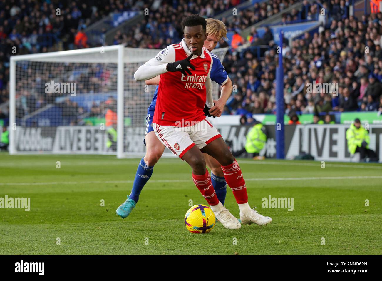 Leicester, UK. 25th Feb 2023. Arsenal's Eddie Nketiah is challenged by Leicester City's Victor Kristiansen during the second half of the Premier League match between Leicester City and Arsenal at the King Power Stadium, Leicester on Saturday 25th February 2023. (Photo: John Cripps | MI News) Credit: MI News & Sport /Alamy Live News Stock Photo