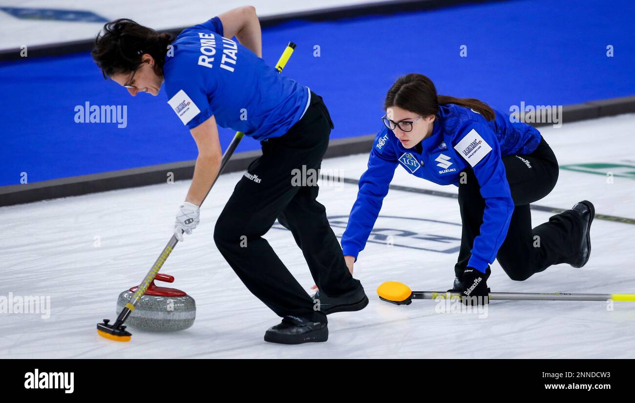 Italy skip Stefania Constantini, right, makes a shot as second Angela ...
