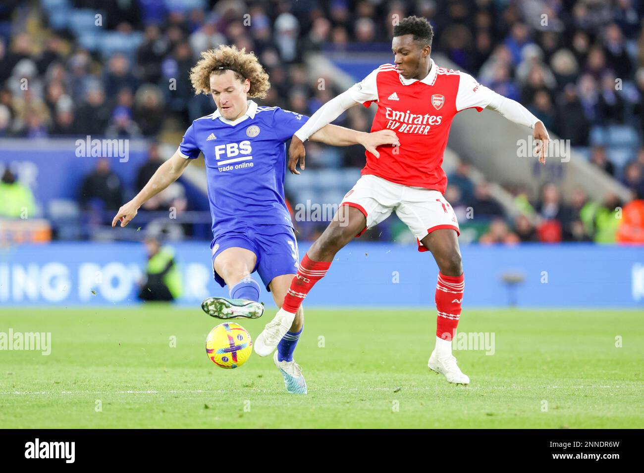 Leicester, UK. 25th Feb 2023. Arsenal's Eddie Nketiah is challenged by Leicester City's Wout Faes during the second half of the Premier League match between Leicester City and Arsenal at the King Power Stadium, Leicester on Saturday 25th February 2023. (Photo: John Cripps | MI News) Credit: MI News & Sport /Alamy Live News Stock Photo
