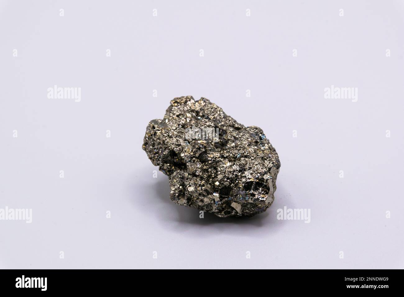 Sparkling pyrite mineral on white background, mineral collection Stock Photo