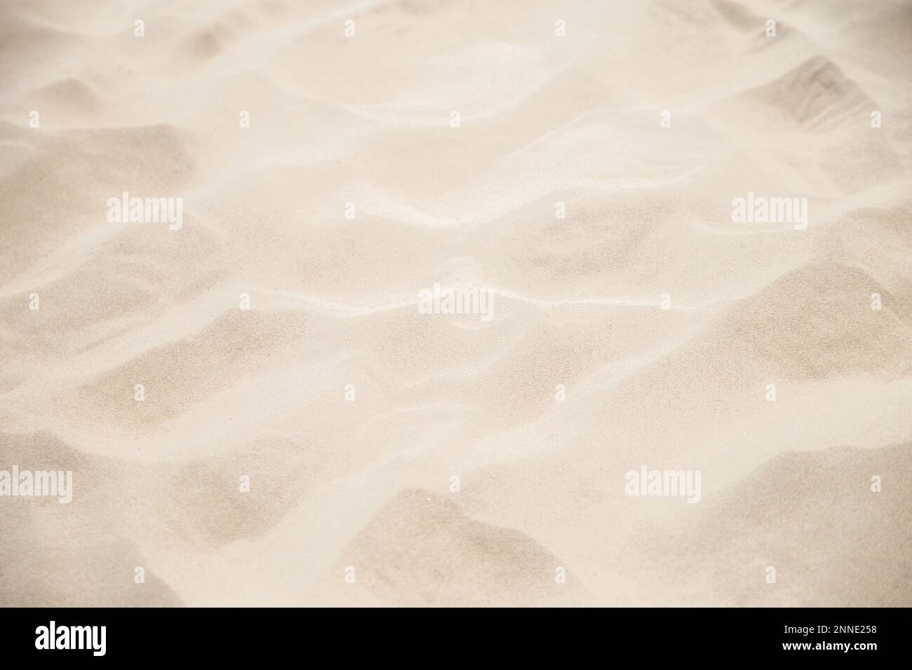 Sand Texture. Brown sand. Background from fine sand. Close-up image. Sandy beach for background. Top view. High resolution texture. Stock Photo