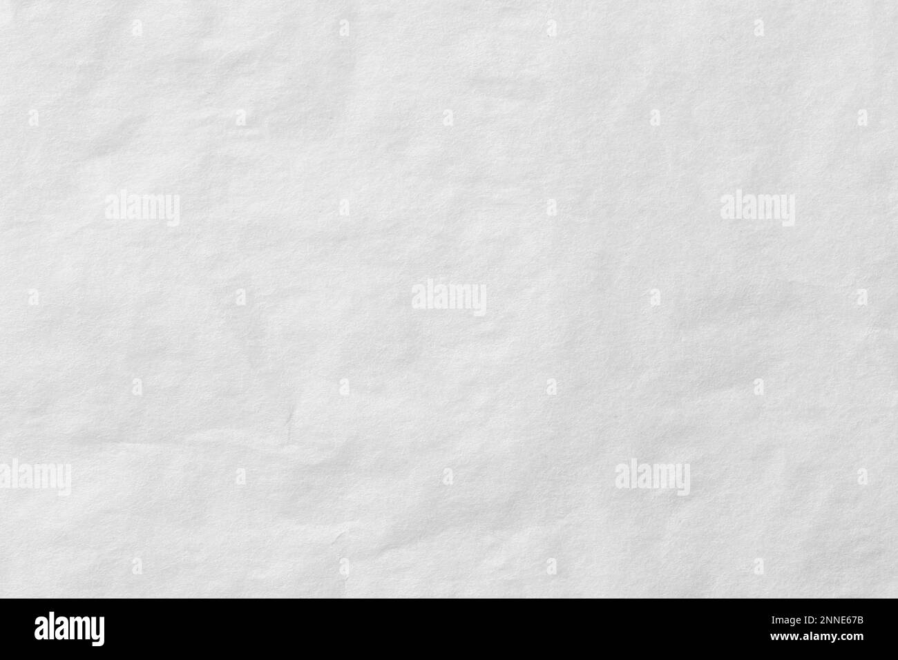 Blank white crumpled and creased paper. White sheet of crumpled paper
