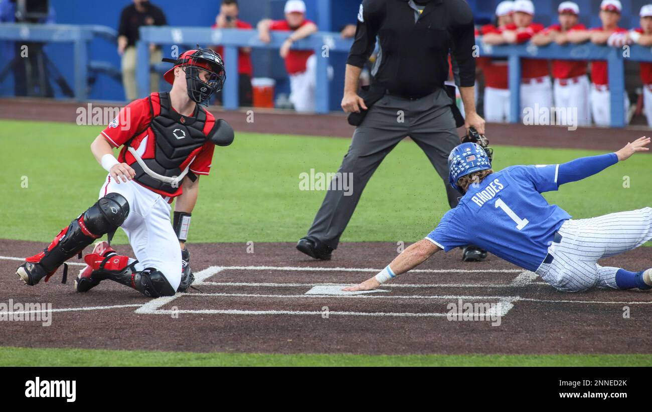 April 20, 2021: Kentuckys John Rhodes slides into home safely past  Louisvilles Henry Davis during a game between the Kentucky Wildcats and the Louisville  Cardinals at Kentucky Pride Park in Lexington, KY.