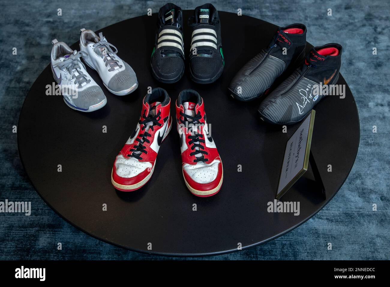 Sample Air Jordan 1s, center, worn by former NBA basketball player Michael  Jordan in 1985 are displayed with game worn Zoom BB from Steve Nash, top  left, TS Bounce Commander from Kevin