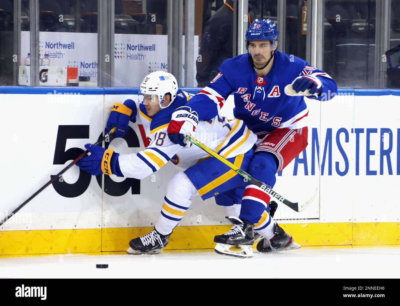 New York Rangers' Chris Kreider (20) Checks Buffalo Sabres' Jacob ...