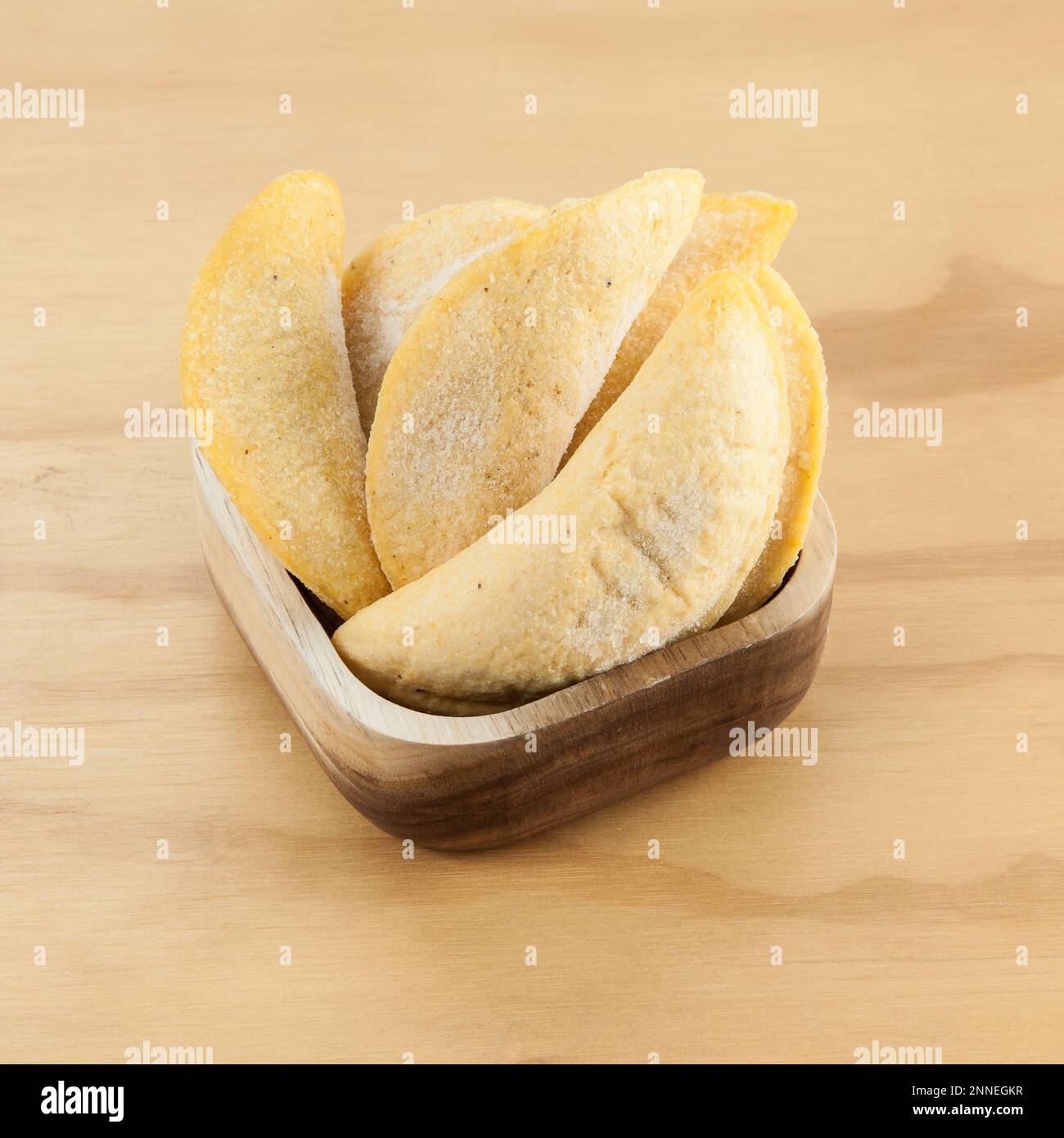 Colombian empanada, frozen raw product ready for frying Stock Photo Alamy