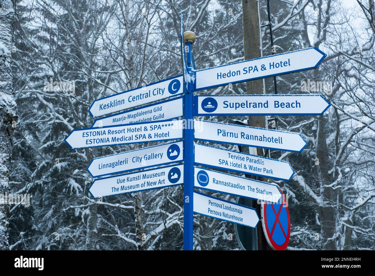 Pärnu, Estonia - February 24, 2023: Sign pointing to different sights ...