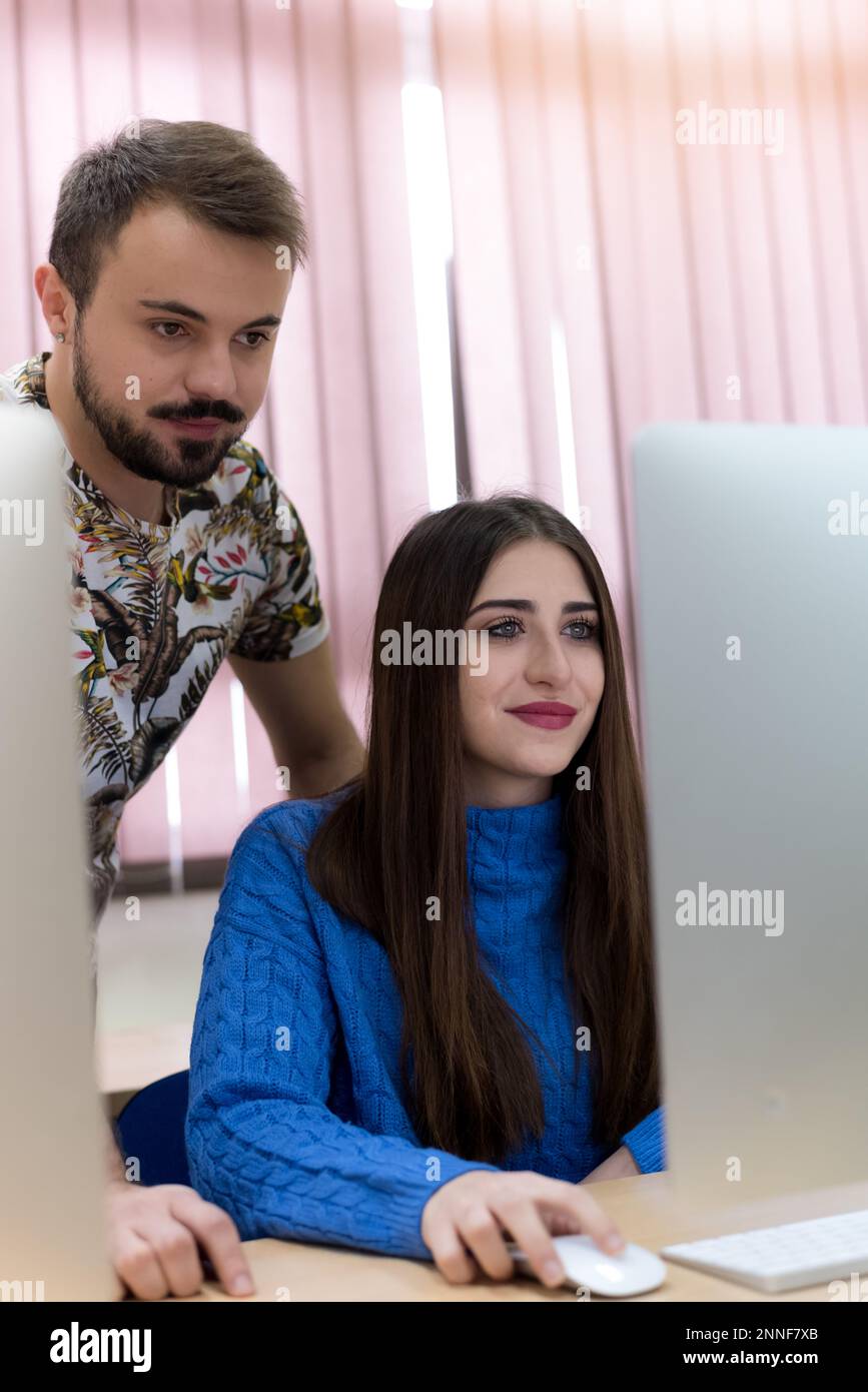 Young people in programming school.Students Learning In A Programing ...