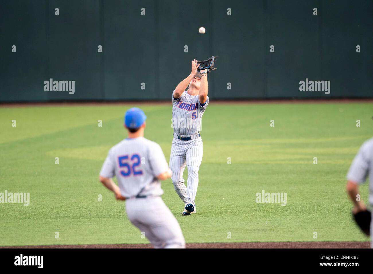 Florida Gators second baseman Colby Halter (5) makes a catch against