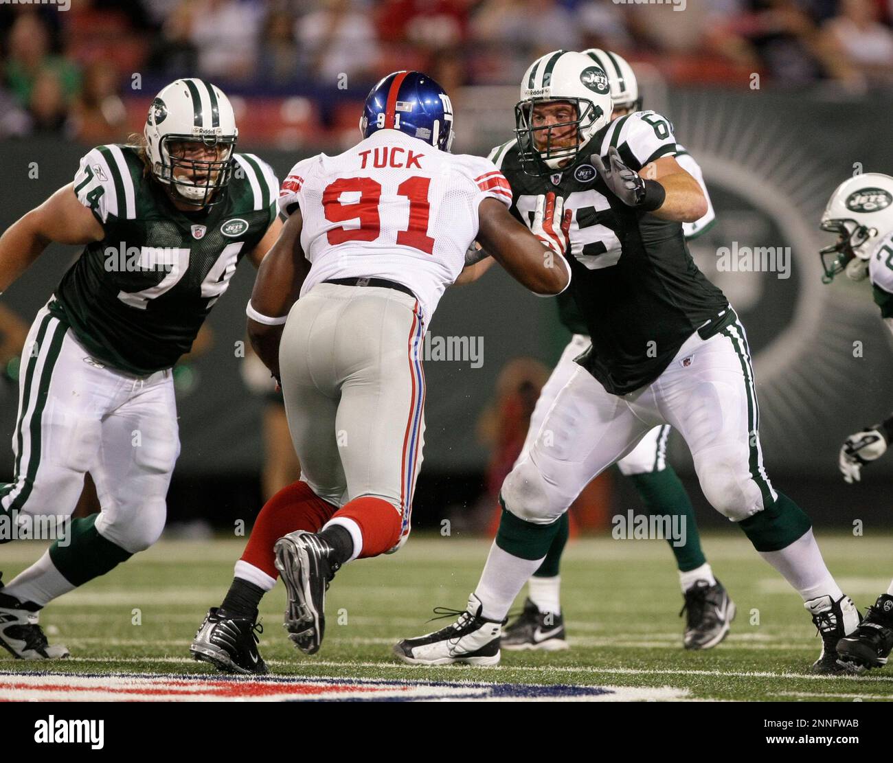 23 August 2008: New York Jets center Nick Mangold (74) and guard Alan ...
