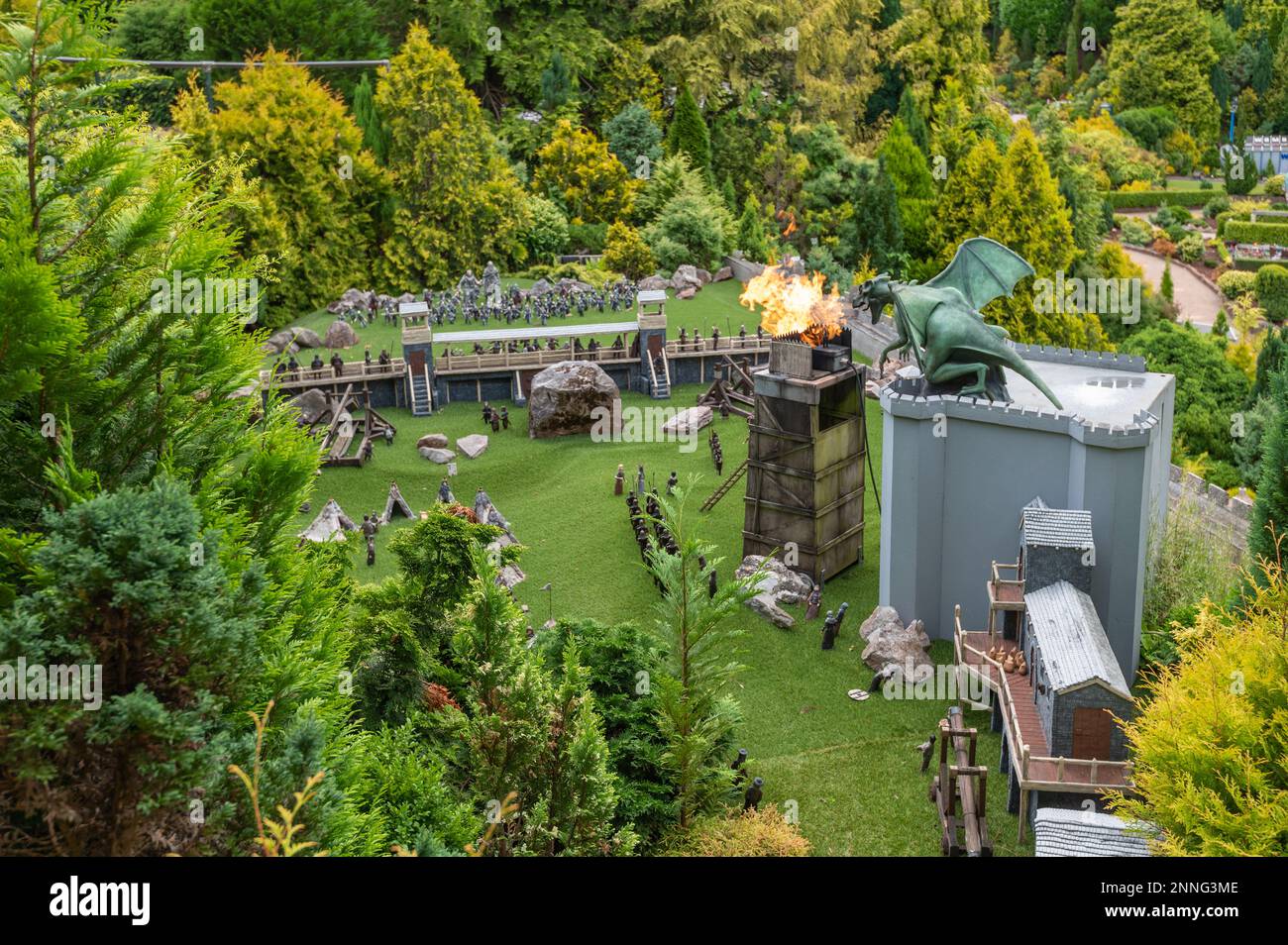 06.08.2021 Torquay, UK. Babbacombe Miniature Model Village. Scene with fire dragon in medieval times. Stock Photo