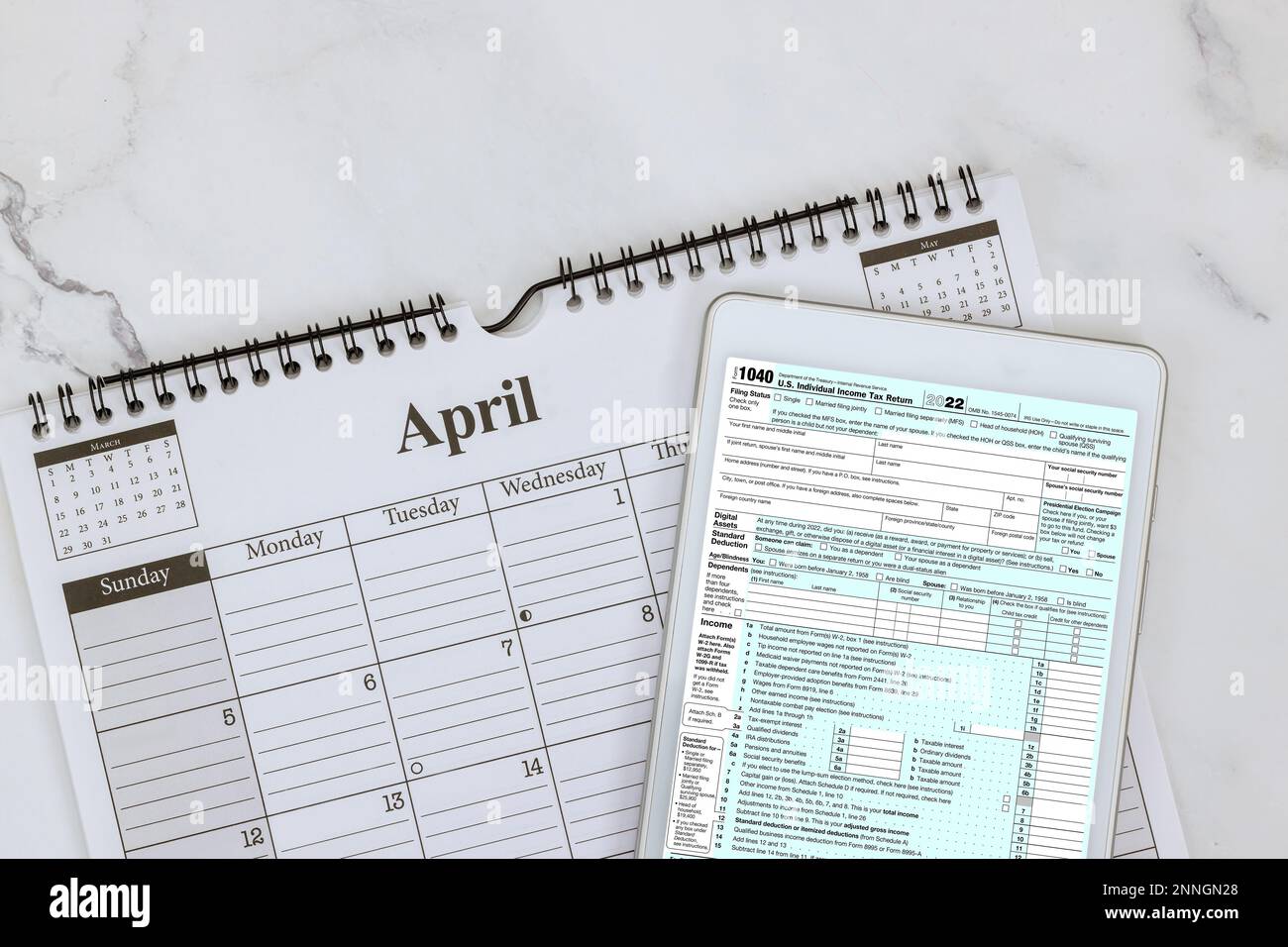 Tax season has begun in United States with 1040 form which is used by individuals to file their tax returns Stock Photo