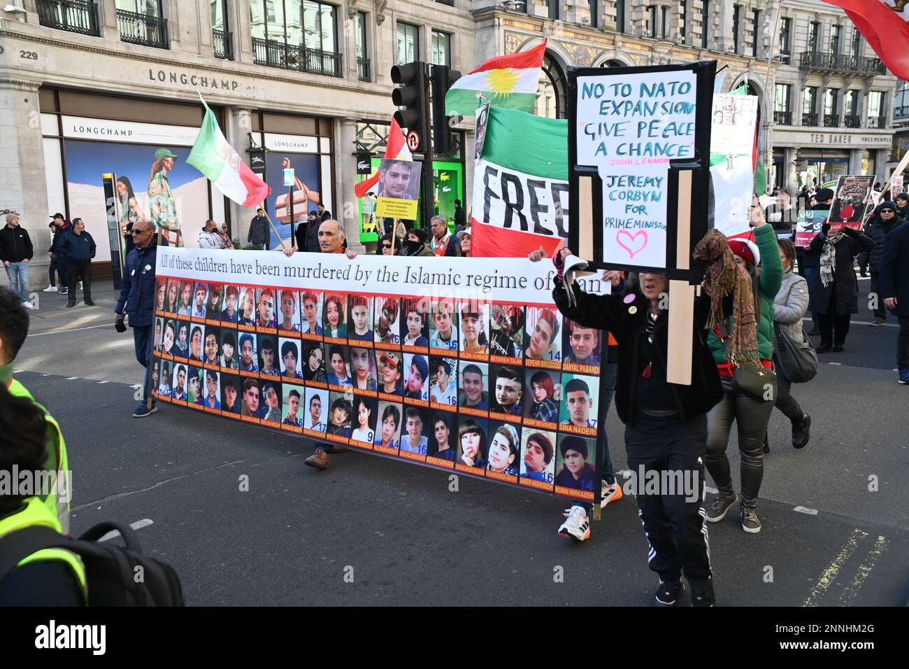 25th February 2023. BBC HQ, London, UK.  Thousands anti-war protestors Stop the War in Ukraine – No to nuclear war, No to Russian invasion, No to nato, assembly outside BBC, march to Trafalgar rally, London, UK. Stock Photo