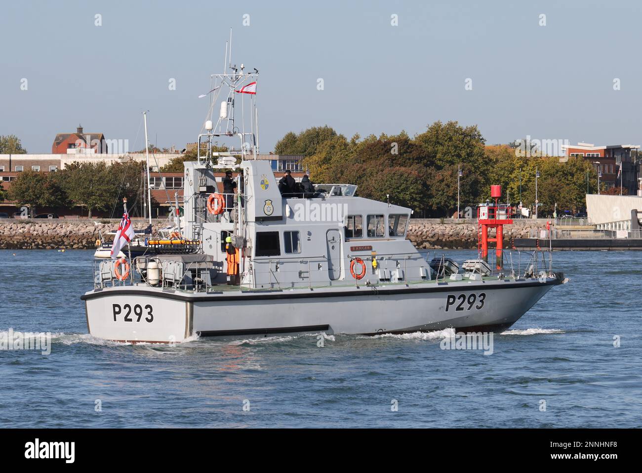 The Royal Navy P2000 patrol boat HMS RANGER (P293) heading into the Naval Base Stock Photo