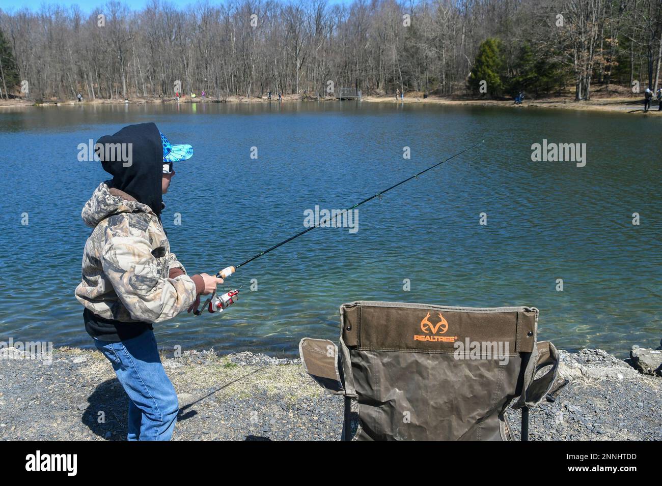 Colt Laudeman, of Minersville, Pa., reels in his line during the
