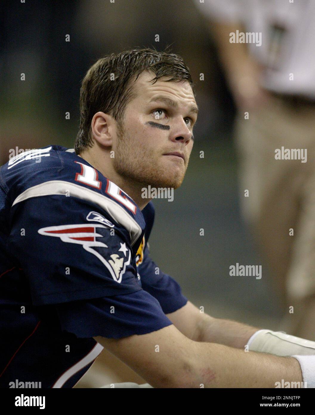 01 Feb 2004: Tom Brady of the New England Patriots holds up the