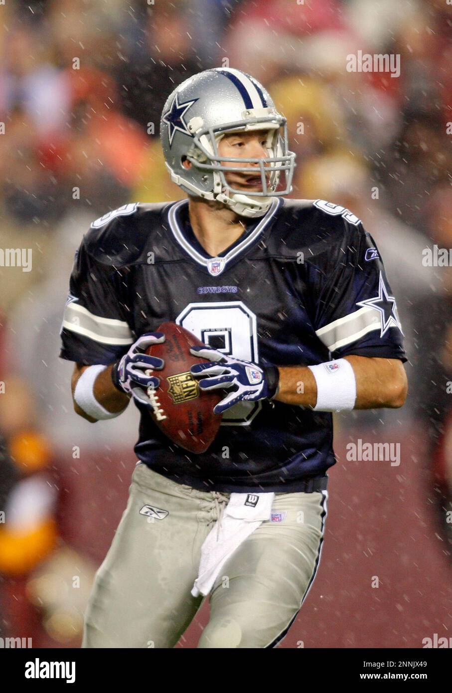 30 December 2007 - Tony Romo (9) of the Dallas Cowboys in the rain during  the Washington