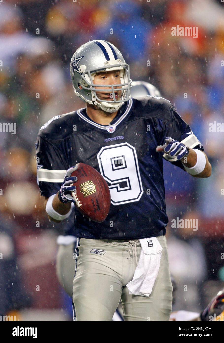 30 December 2007 - Tony Romo (9) of the Dallas Cowboys in the rain during  the Washington