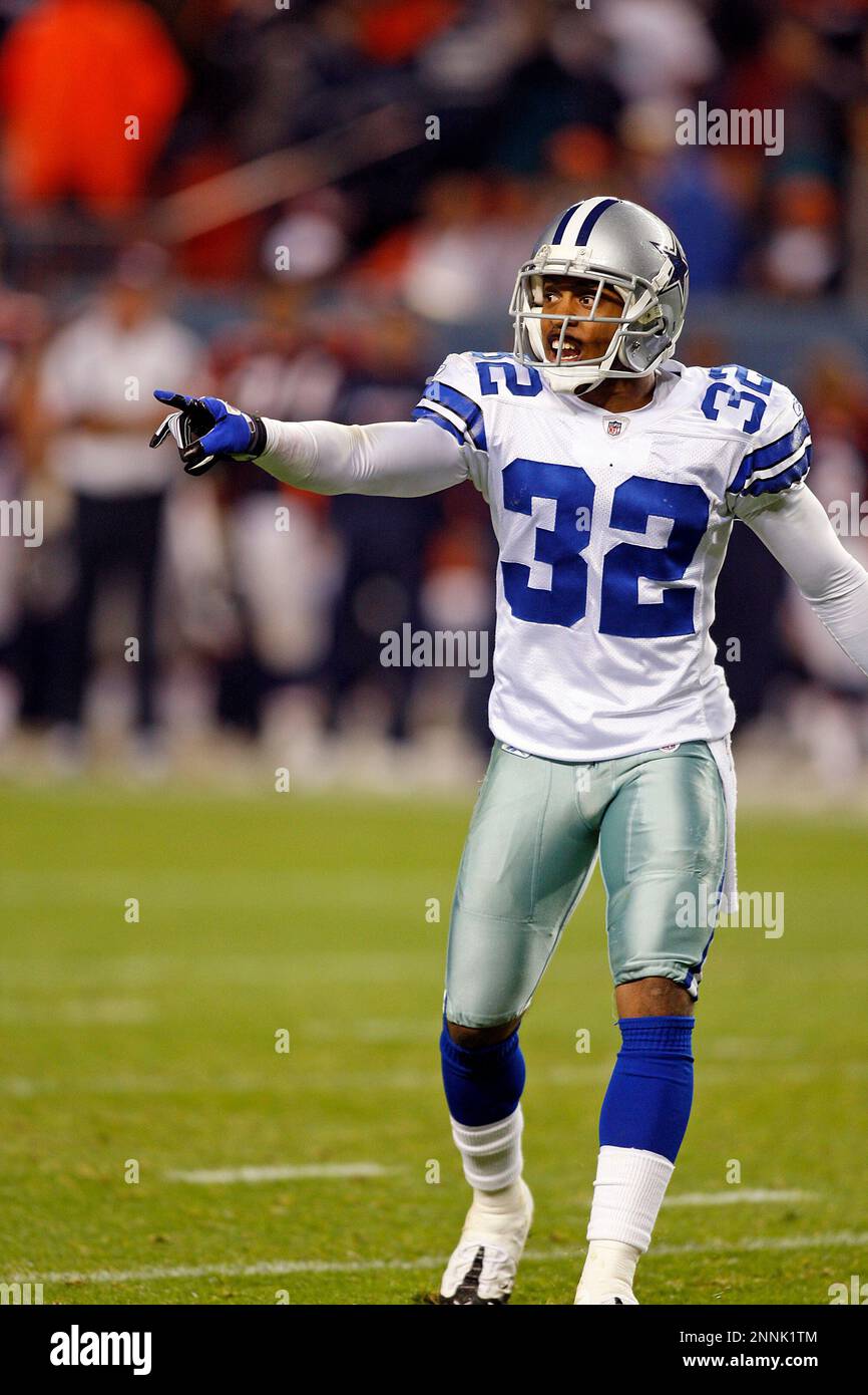 16 August 2008 - Evan Oglesby (23) and Patrick Watkins (25) of the Dallas  Cowboys tackle Brandon Stokley (14) of the Denver Broncos during the  Cowboys preseason game with the Broncos at