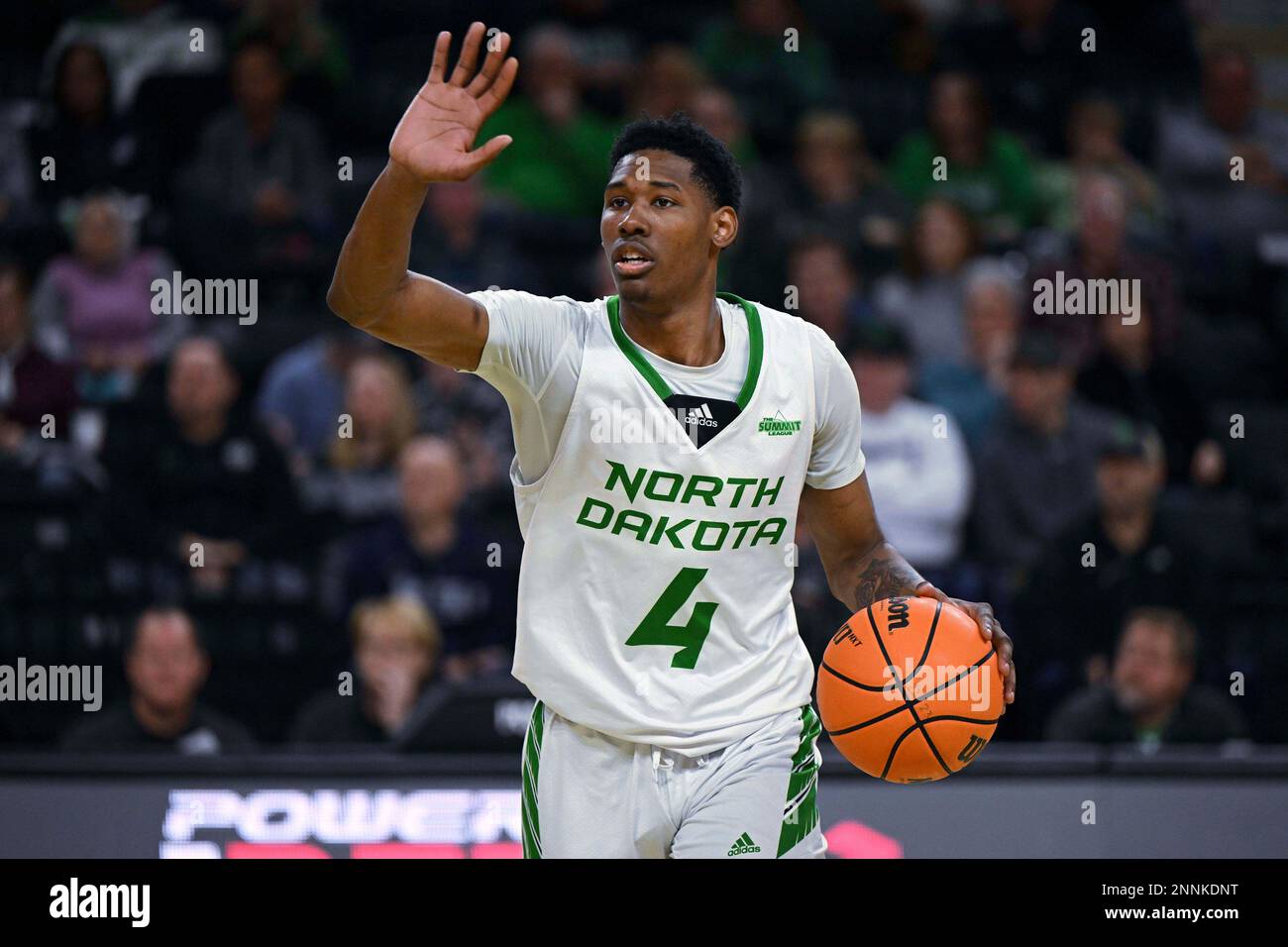North Dakota Fighting Hawks guard Jalun Trent 4 calls a play as