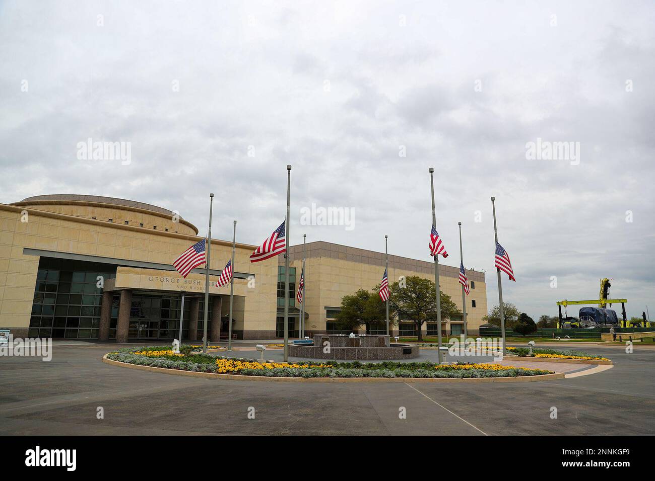 At right, Union Pacific Engine 4141 sits on a 12-axle trailer while ...