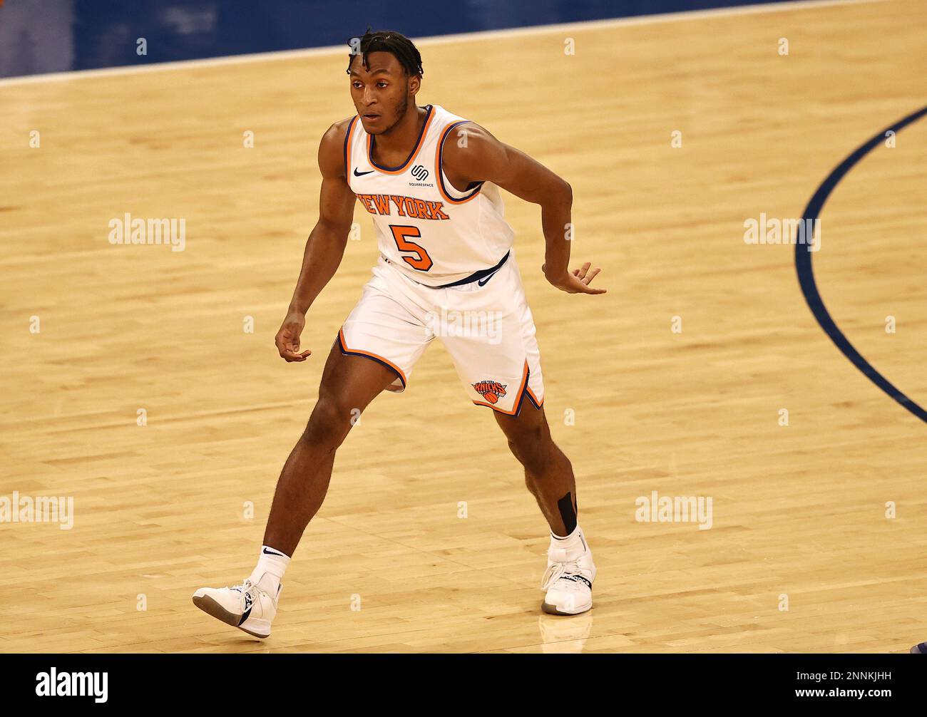New York Knicks' Immanuel Quickley celebrates his threepoint basket in