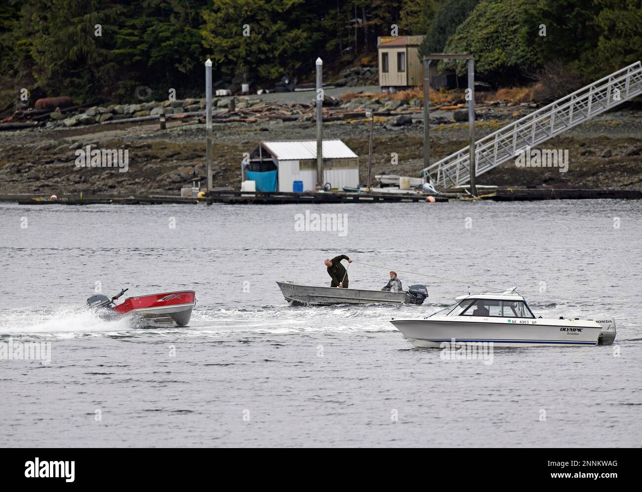 William Baghoomian prepares a rope to unlock a stuck throttle on an