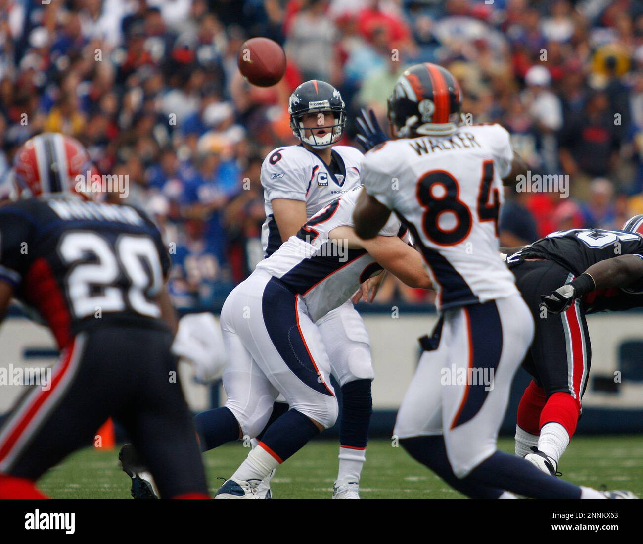 Denver Broncos quarterback Jay Cutler warms up at Invesco Field at