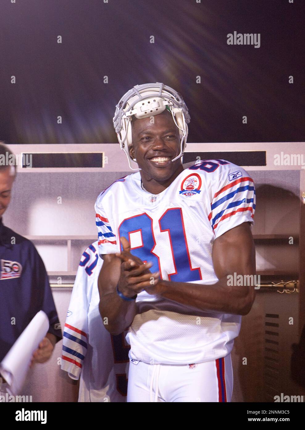 30 July 2009: Wide Reciever Terrell Owens of the Buffalo Bills unveils the  new throwback uniforms after the Bills Thursday night practice at St. John  Fisher College in Pittsford, New York. (Icon