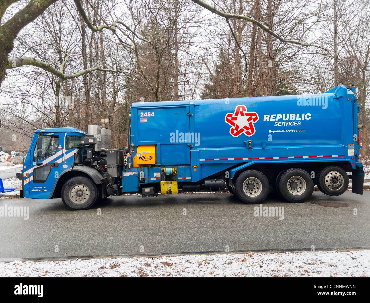 Republic Services garbage truck collect trash and recycle dust bins in