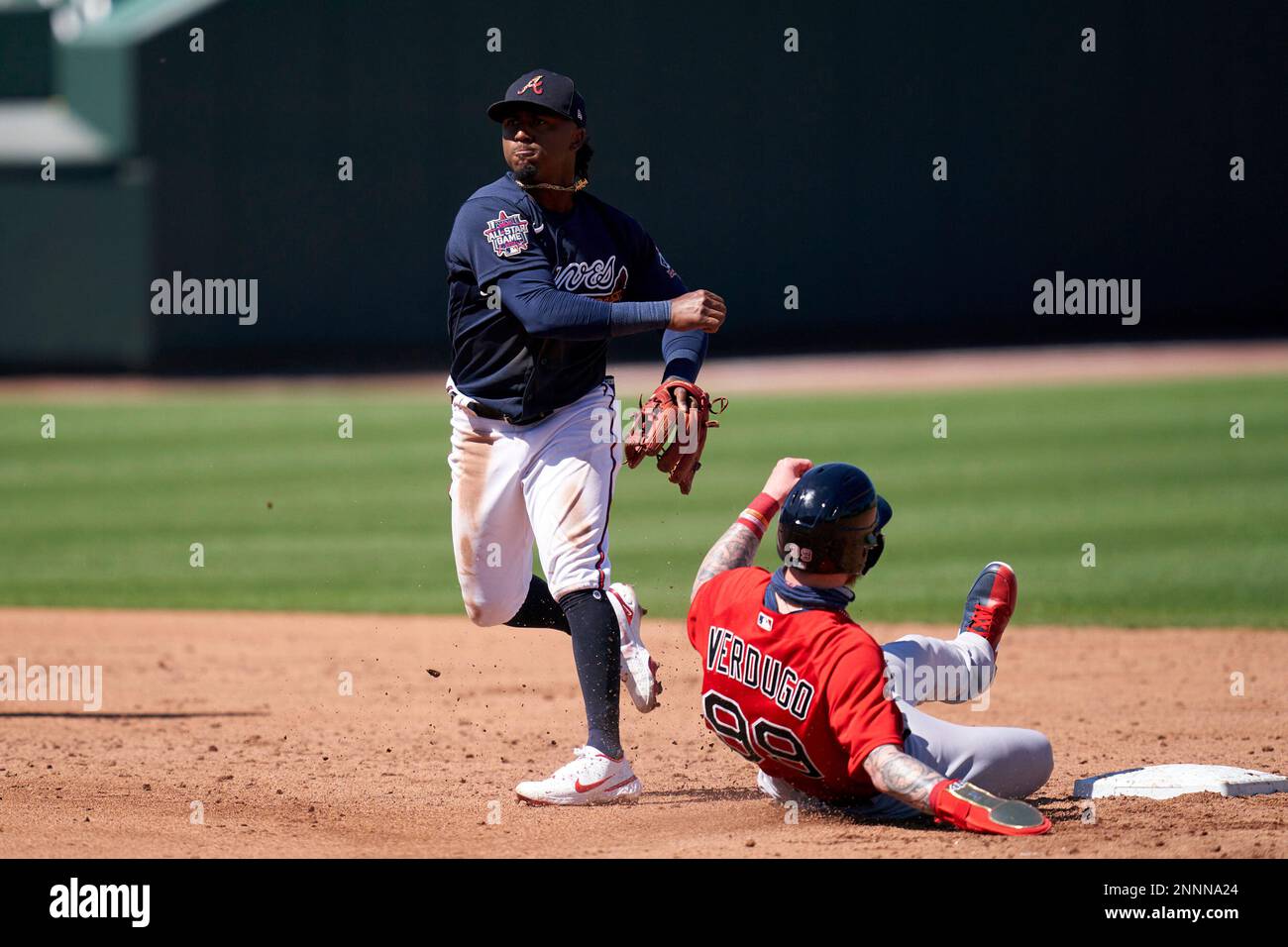 Atlanta, GA, USA. 04th July, 2019. Atlanta Braves shortstop Dansby Swanson  (left) kisses the head of infielder Ozzie Albies (right) after hitting an  eighth inning home run during a MLB game against