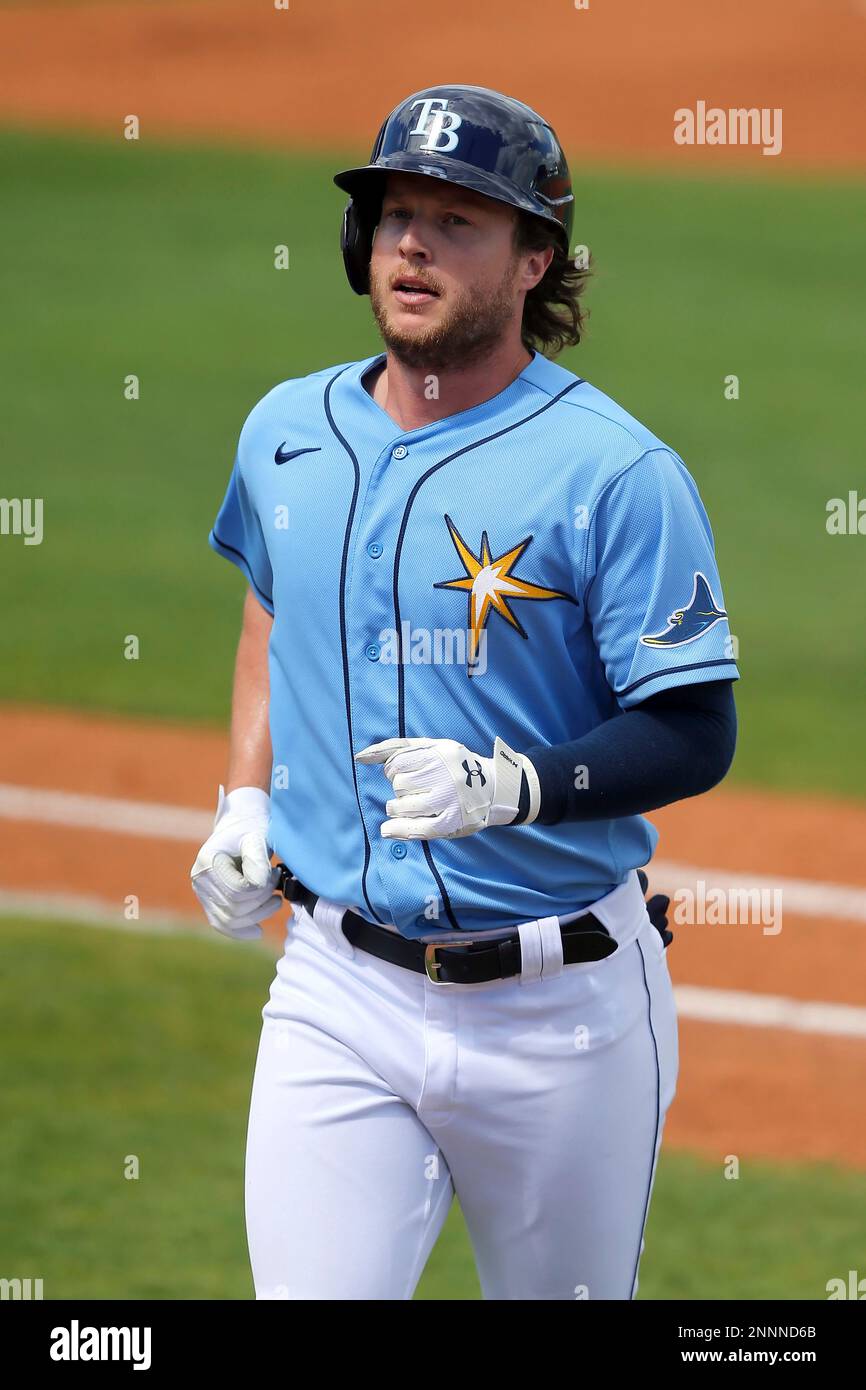 Port Charlotte, FL USA: Tampa Bay Rays starting pitcher Shane McClanahan  (18) was watching the game during a spring training baseball game against  the Boston Red Sox, Tuesday, March 22, 2022, at