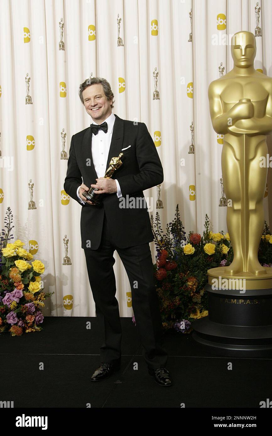Actor Colin Firth holds the award for Best Actor in a Motion Picture for his role in 'The King's Speech' poses in the press room at the 83rd Annual Academy Awards held at the Kodak Theatre on February 27, 2011 in Hollywood, California. Photo by Francis Specker Stock Photo